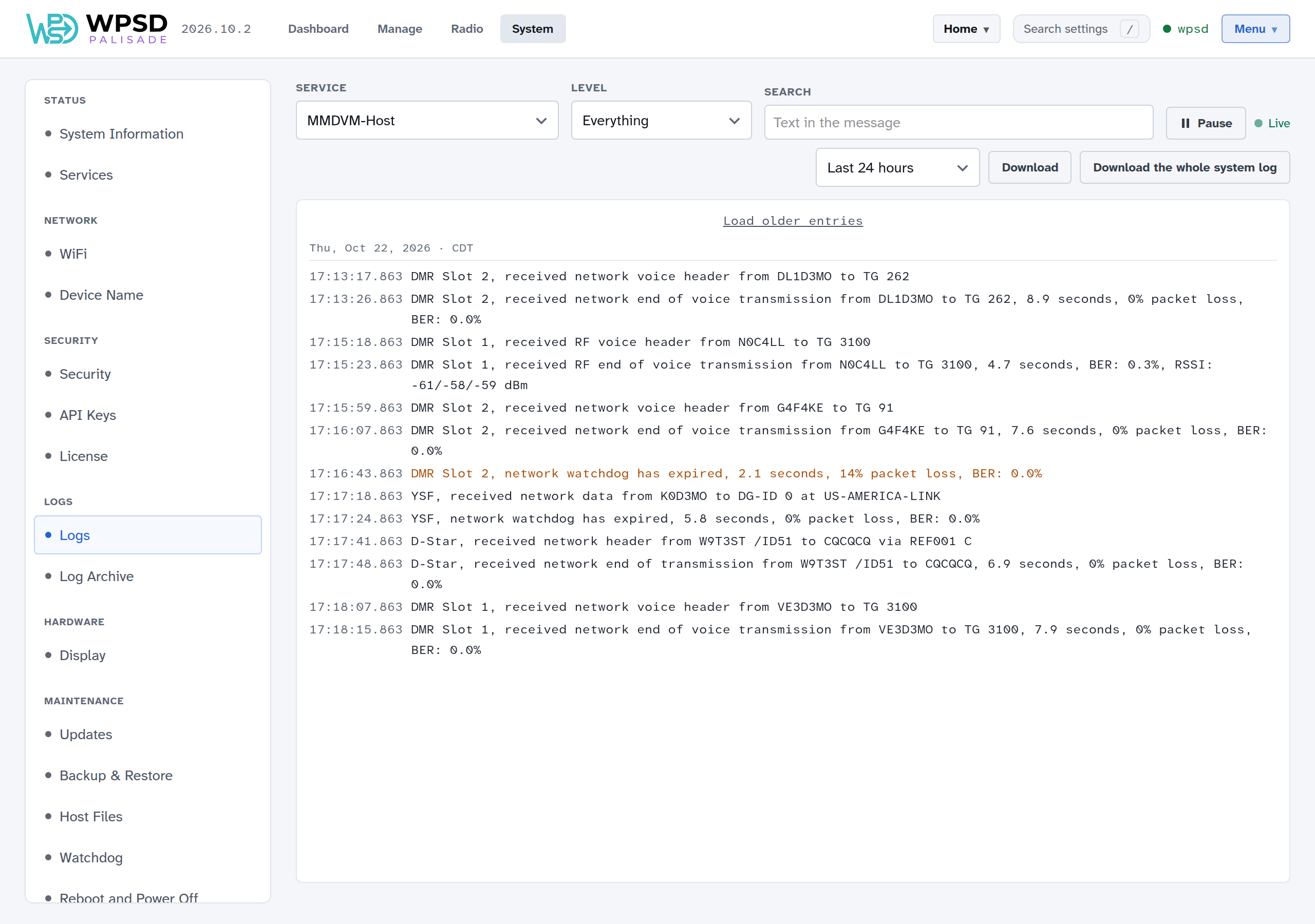 System > Logs following MMDVM-Host live: DMR, YSF and D-Star calls with their duration, packet loss and BER, and a network watchdog warning in amber